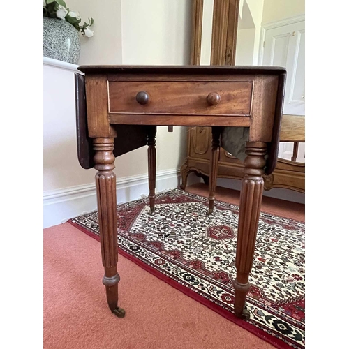 3148 - A Victorian mahogany Pembroke table, raised on turned and fluted legs and brass casters, height 71cm... 