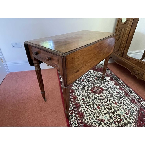 3148 - A Victorian mahogany Pembroke table, raised on turned and fluted legs and brass casters, height 71cm... 