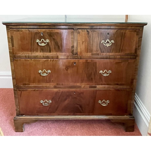 3149 - An 18th century walnut and crossbanded chest of two short and two long drawers on bracket feet, heig... 