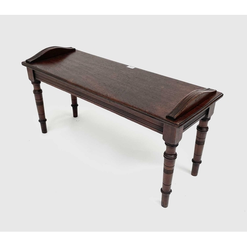 3150 - A Victorian mahogany hall bench, raised on turned legs. Height 47cm, width 91cm, depth 33cm.