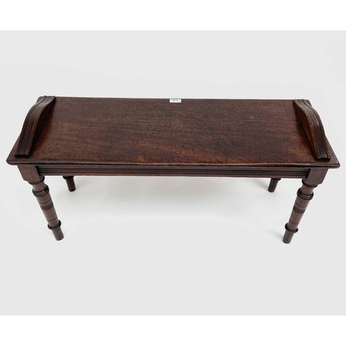 3150 - A Victorian mahogany hall bench, raised on turned legs. Height 47cm, width 91cm, depth 33cm.