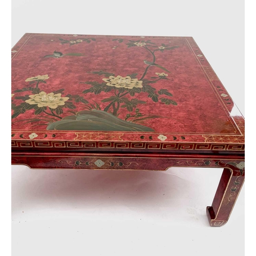 3151 - An oriental red lacquer low centre table, late 20th century, decorated in the Chinoiserie style. Hei... 