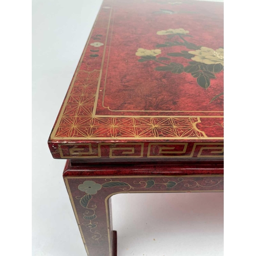 3151 - An oriental red lacquer low centre table, late 20th century, decorated in the Chinoiserie style. Hei... 