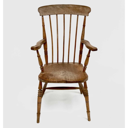 3156 - A late Victorian beech and elm kitchen elbow chair.