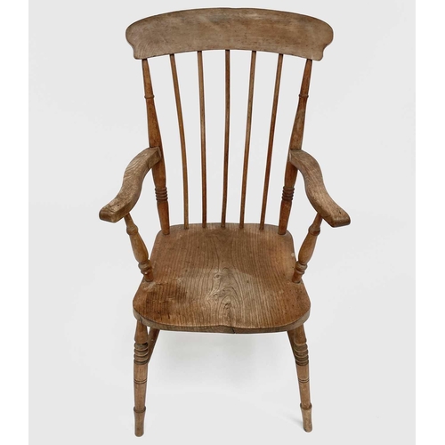 3156 - A late Victorian beech and elm kitchen elbow chair.