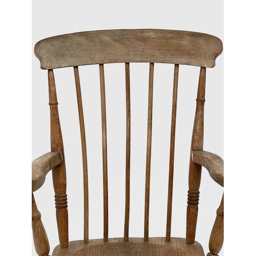 3156 - A late Victorian beech and elm kitchen elbow chair.