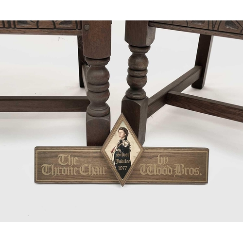 3163 - A pair of oak throne chairs, with leather upholstered backs and seats, produced to commemorate the 1... 