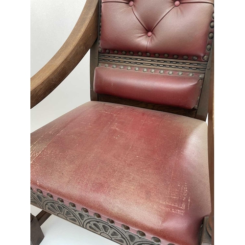 3163 - A pair of oak throne chairs, with leather upholstered backs and seats, produced to commemorate the 1... 