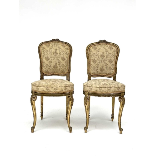 3172 - A Pair of 19th century French giltwood salon chairs with tapestry upholstered seats and backs, on ca... 