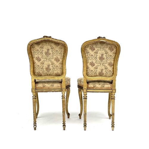 3172 - A Pair of 19th century French giltwood salon chairs with tapestry upholstered seats and backs, on ca... 