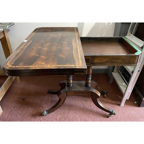 3174 - A Regency brass inlaid rosewood fold top card table on twin column supports and sabre legs. Height 7... 