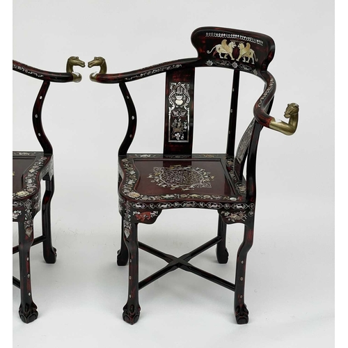 3177 - A pair of Chinese red lacquered corner armchairs, highly decorative with mother of pearl, the arms t... 