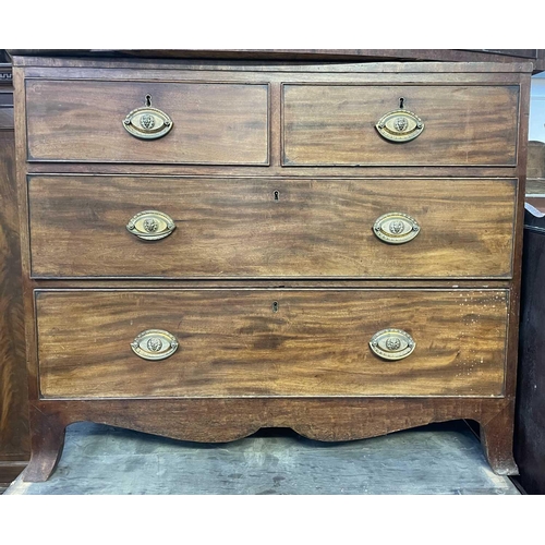 3180 - A mahogany chest of drawers, early 19th century, with two short and two long drawers, on splay feet,... 