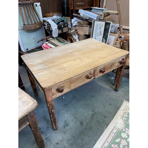 3182 - A Victorian pine kitchen table, the rectangular top with rounded corners, on partly turned square se... 