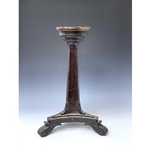 3183 - A mahogany candle stand, formed with the base of a Regency tripod table base, height 67cm and mahoga... 