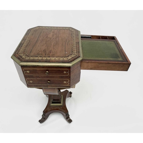 3184 - A Regency rosewood and brass inlaid work table, the octagonal top above two fitted drawers and dummy... 