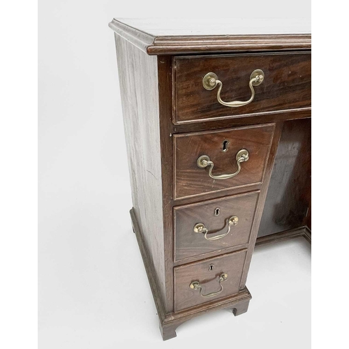 3185 - A George III mahogany kneehole desk, with a single frieze drawer above six drawers flanking a cupboa... 