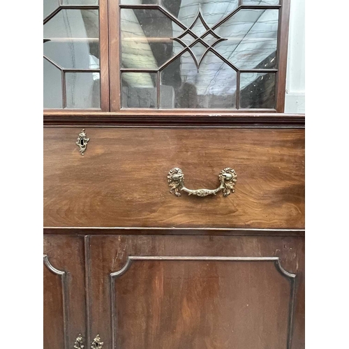 3188 - A George III mahogany secretaire bookcase, in the style of Thomas Chippendale, the fine fretwork cor... 