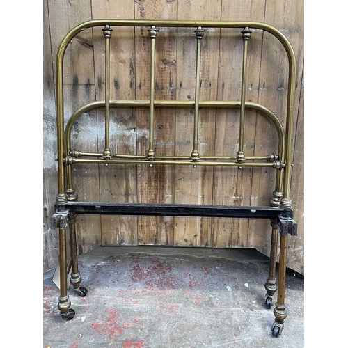 3199 - Two Victorian brass single beds, with railed ends and wrought iron bases, height 118cm, width 92cm, ... 