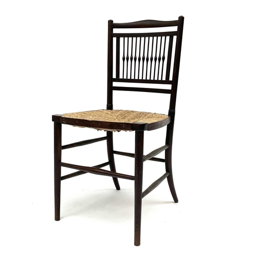 3201 - A walnut rush seated chair, early 20th century, in the Goodwin style, with spindle back.