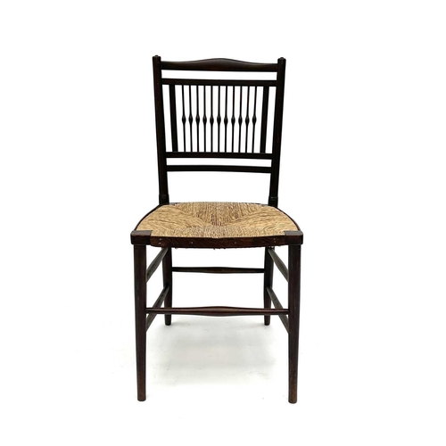 3201 - A walnut rush seated chair, early 20th century, in the Goodwin style, with spindle back.