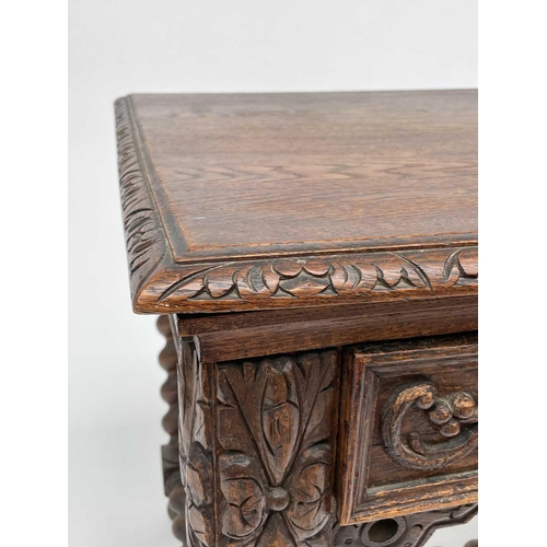 3205 - A Victorian carved oak library or centre table, fitted with two carved front drawers and raised on t... 