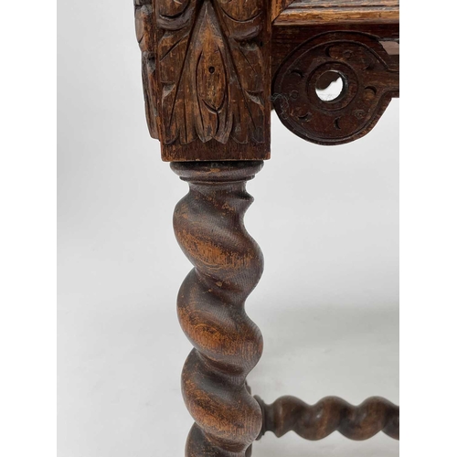 3205 - A Victorian carved oak library or centre table, fitted with two carved front drawers and raised on t... 