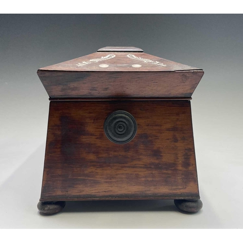 321 - A Regency rosewood and mother of pearl inlaid tea caddy, fitted with two lidded compartments, width ... 