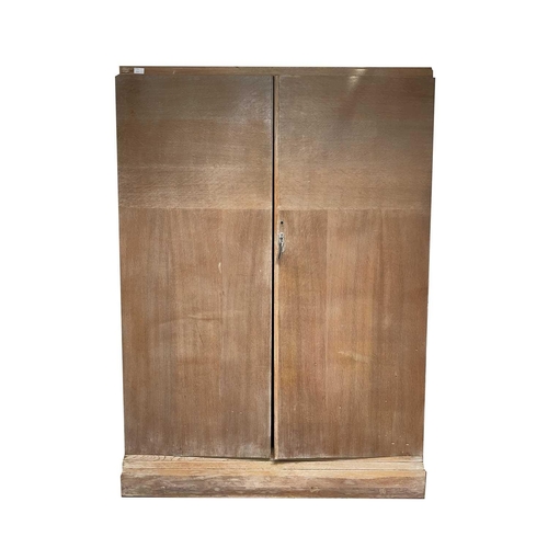 3221 - An oak veneered 1930s patent Compactum wardrobe, with typical well fitted interior, with compartment... 