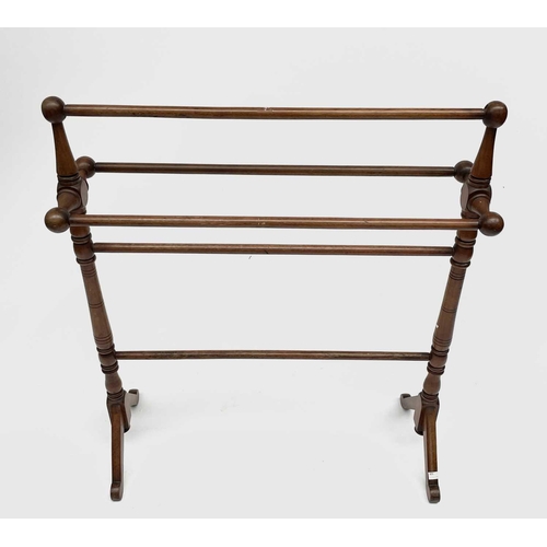 3222 - A Victorian walnut towel rail, width 75.5cm.