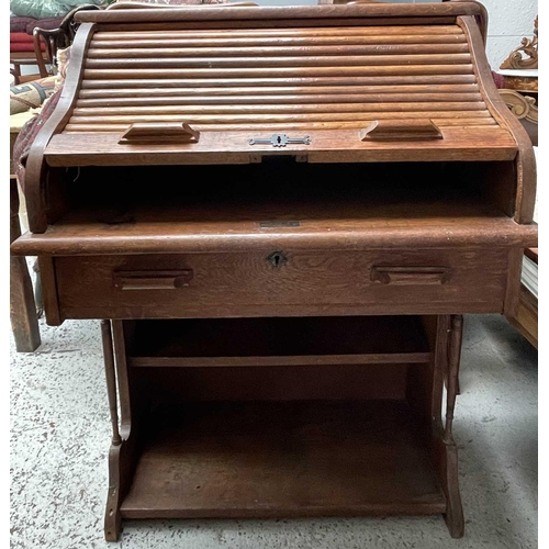 3226 - An oak roll top desk, height 102cm, width 76cm, width 49cm.