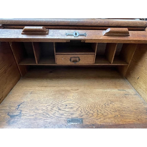 3226 - An oak roll top desk, height 102cm, width 76cm, width 49cm.