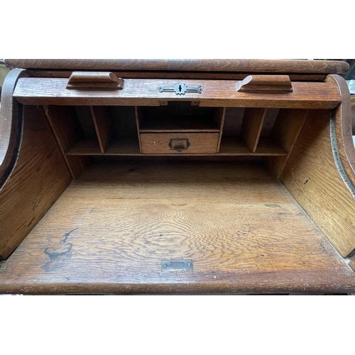 3226 - An oak roll top desk, height 102cm, width 76cm, width 49cm.