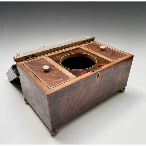 323 - A late George III mahogany and crossbanded tea caddy, with two lidded compartments, width 29cm, toge... 