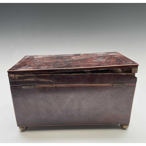 323 - A late George III mahogany and crossbanded tea caddy, with two lidded compartments, width 29cm, toge... 