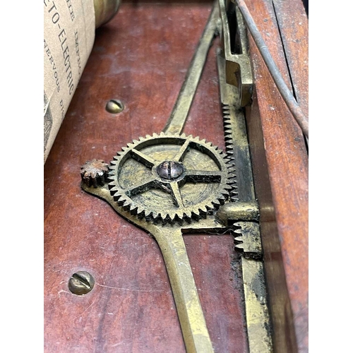 33 - A late Victorian mahogany cased improved magneto-electric machine with indicator dial and complete w... 