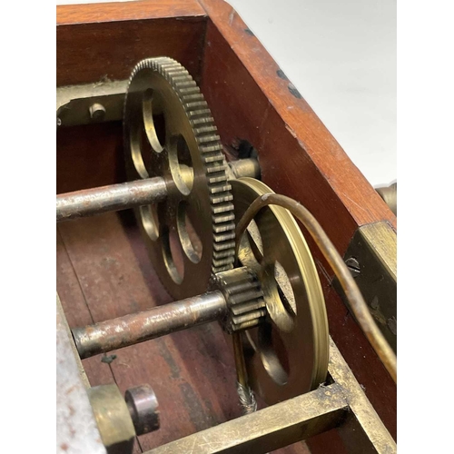 33 - A late Victorian mahogany cased improved magneto-electric machine with indicator dial and complete w... 