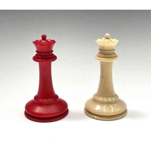 331 - A mid 19th century Jacques London red-stained and natural ivory Staunton chess set, the natural ivor... 