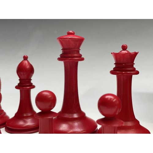 331 - A mid 19th century Jacques London red-stained and natural ivory Staunton chess set, the natural ivor... 