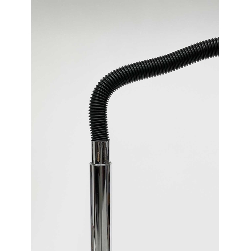 332 - A chrome standard lamp, later 20th century, with flexible upper stem, dished shade and circular base... 