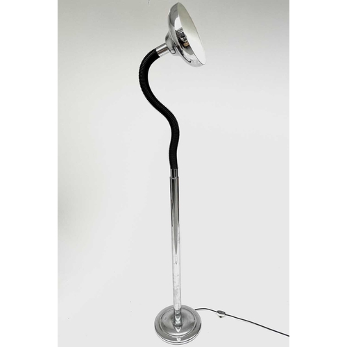 332 - A chrome standard lamp, later 20th century, with flexible upper stem, dished shade and circular base... 