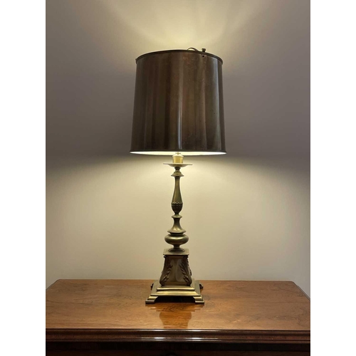 335 - A brass table lamp, 20th century of neo-classical form, with metal shade and leaf capped square base... 