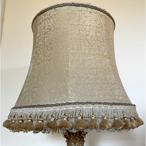 336 - A gilt plaster Corinthian column table lamp with gold brocade shade, overall height 78cm.