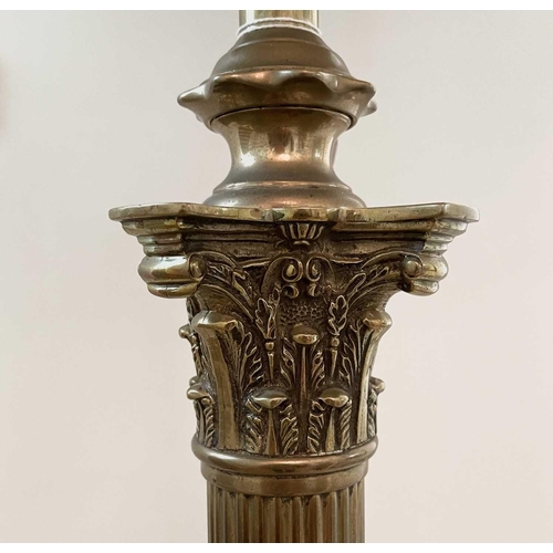 339 - A brass Corinthian column standard lamp, late Victorian, raised on a stepped square base, overall he... 