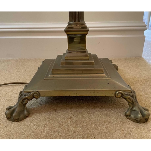 339 - A brass Corinthian column standard lamp, late Victorian, raised on a stepped square base, overall he... 