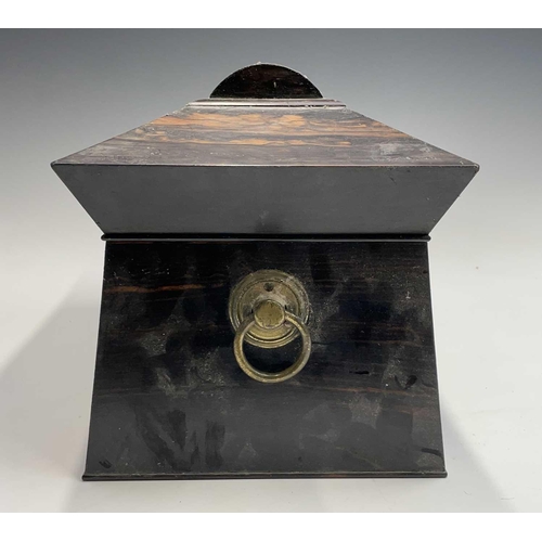 34 - An early Victorian coromandel wood tea caddy, of sarcophagus shape, with glass mixing bowl and twin ... 