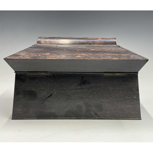 34 - An early Victorian coromandel wood tea caddy, of sarcophagus shape, with glass mixing bowl and twin ... 