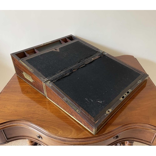 340 - A late George III rosewood and brass bound campaign writing box, with fitted interior, width 42cm.