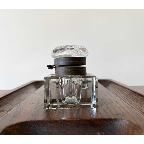 342 - An oak deskstand, circa 1920's, fitted with two glass inkwells, width 26cm.