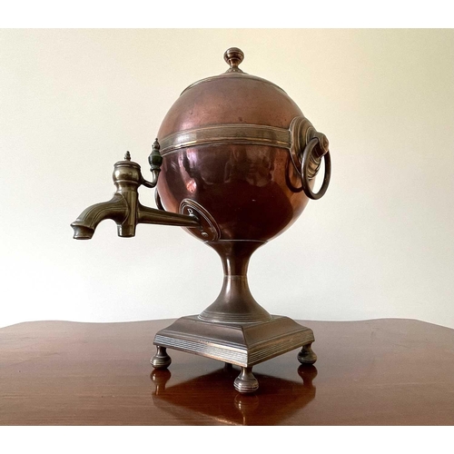 343 - A Regency copper and brass tea urn, of spherical form on a square base, height 32cm.